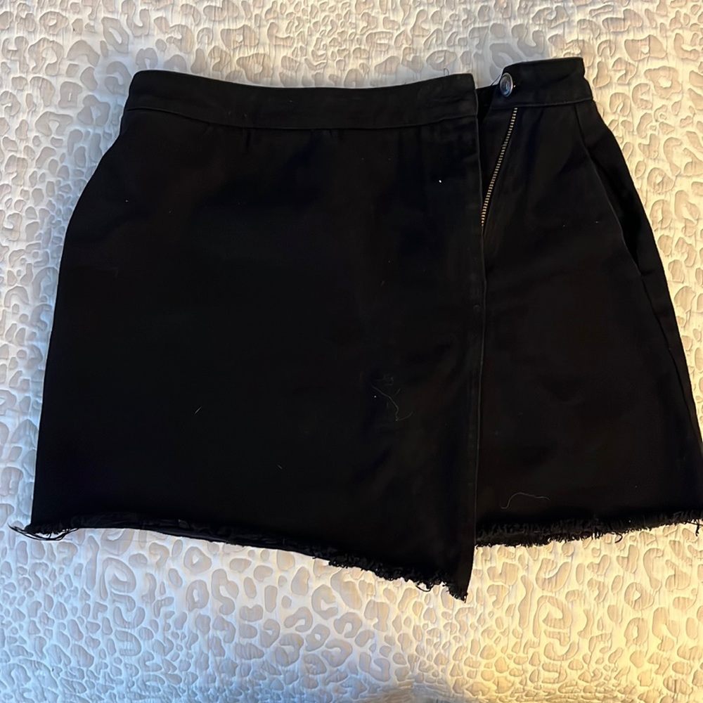 Black denim mini skirt
